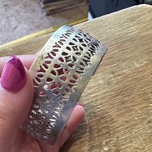 Consignment item..
Elegant Silver tone Cutout Bangle Bracelet